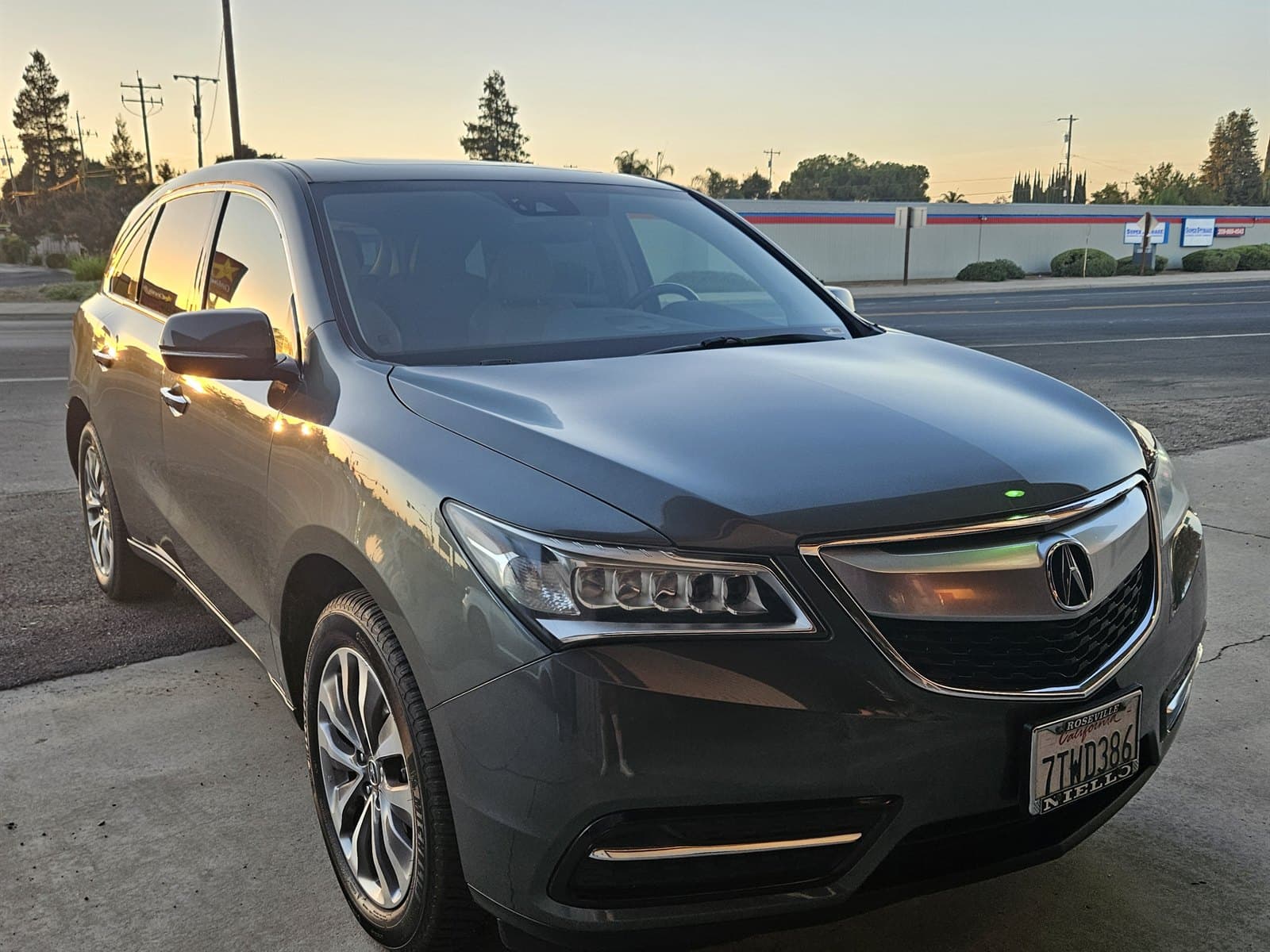 Glossy Acura MDX after ceramic coating service